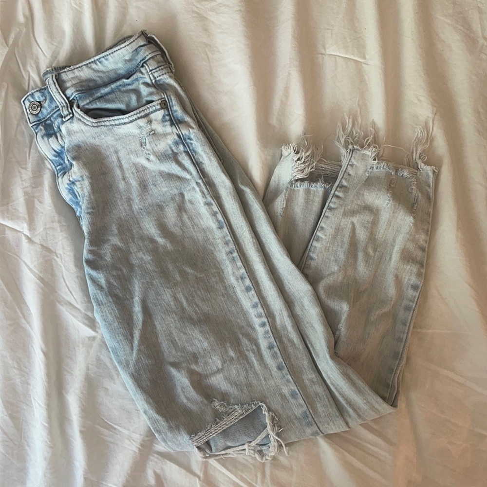 Distressed light wash jeans